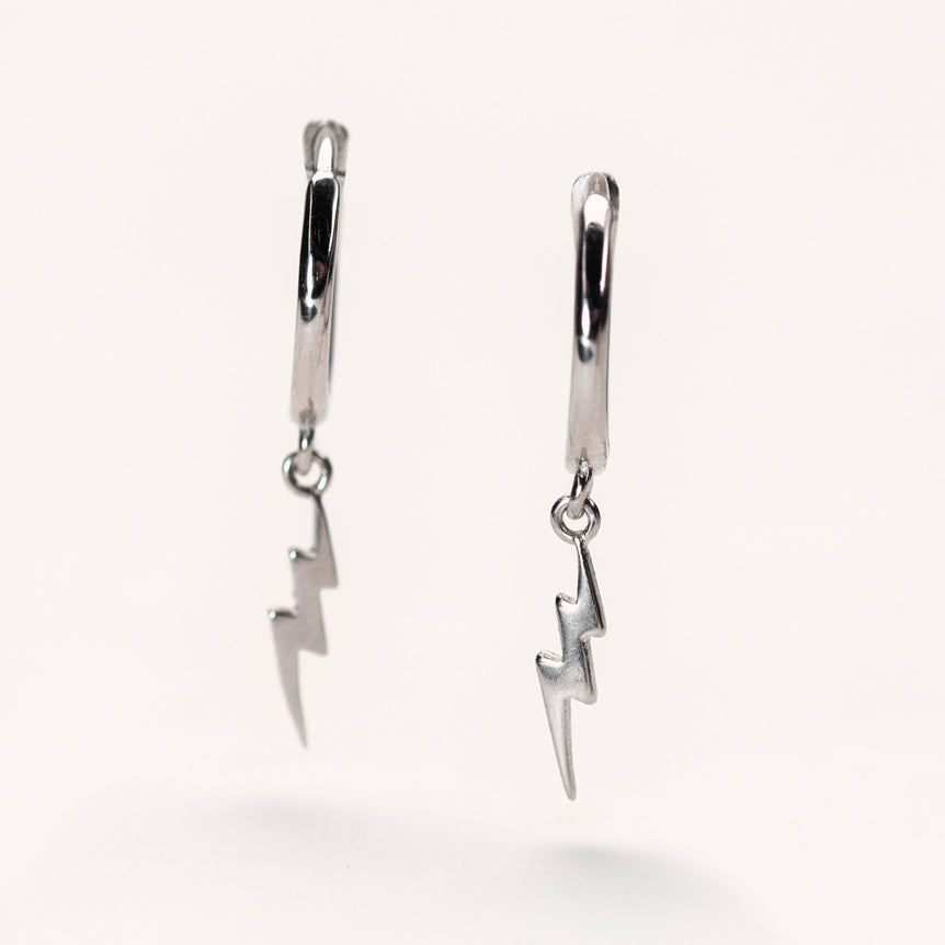 Silver Lightning Bolt Huggie Earrings No – Raf and Grace